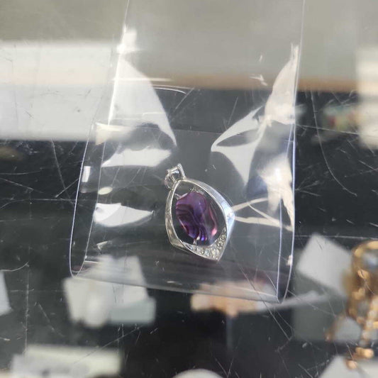 Silver Pendant With Purple Gem