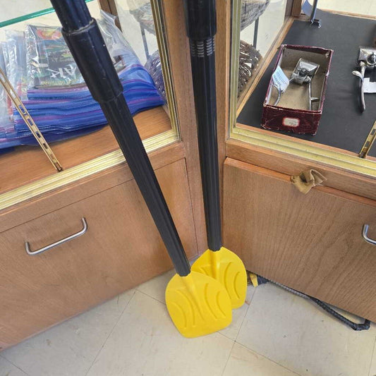 Pair Of Yellow Plastic Paddles