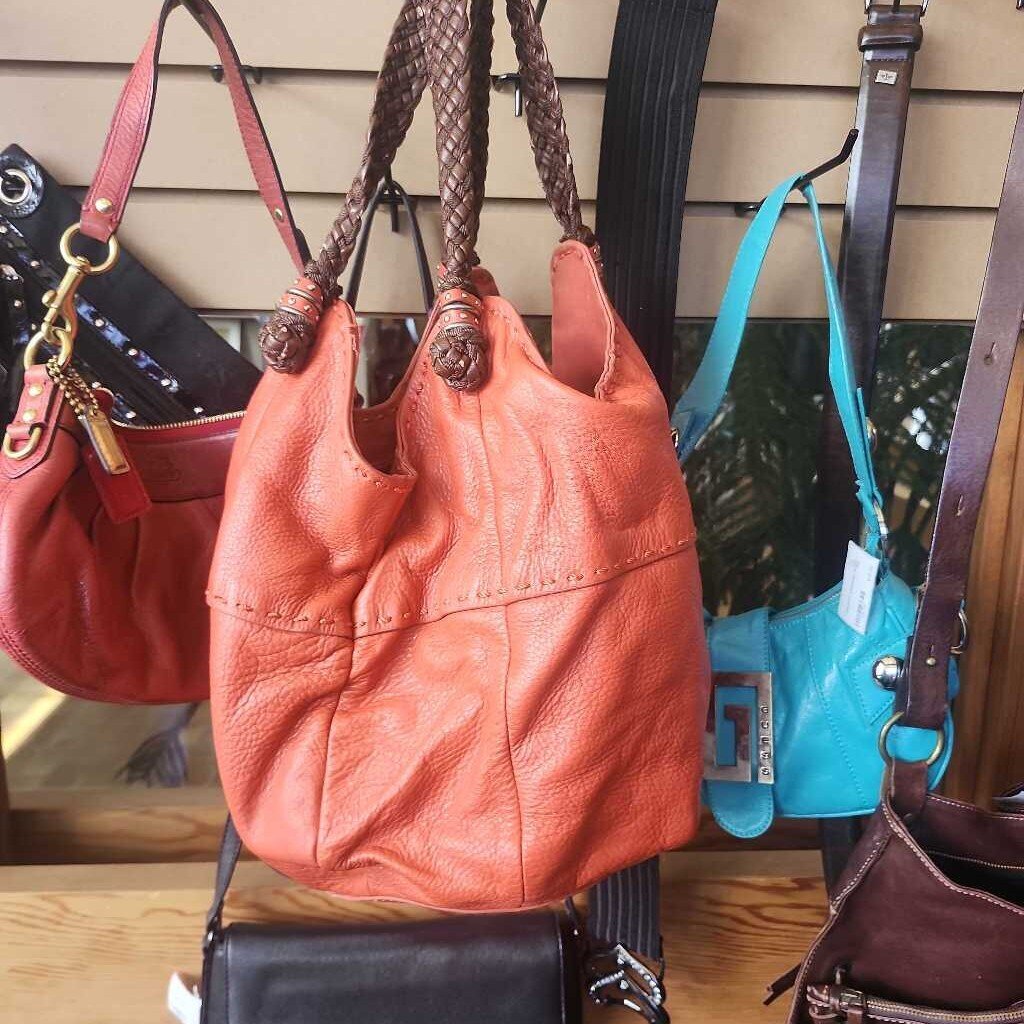 the Sak red purse