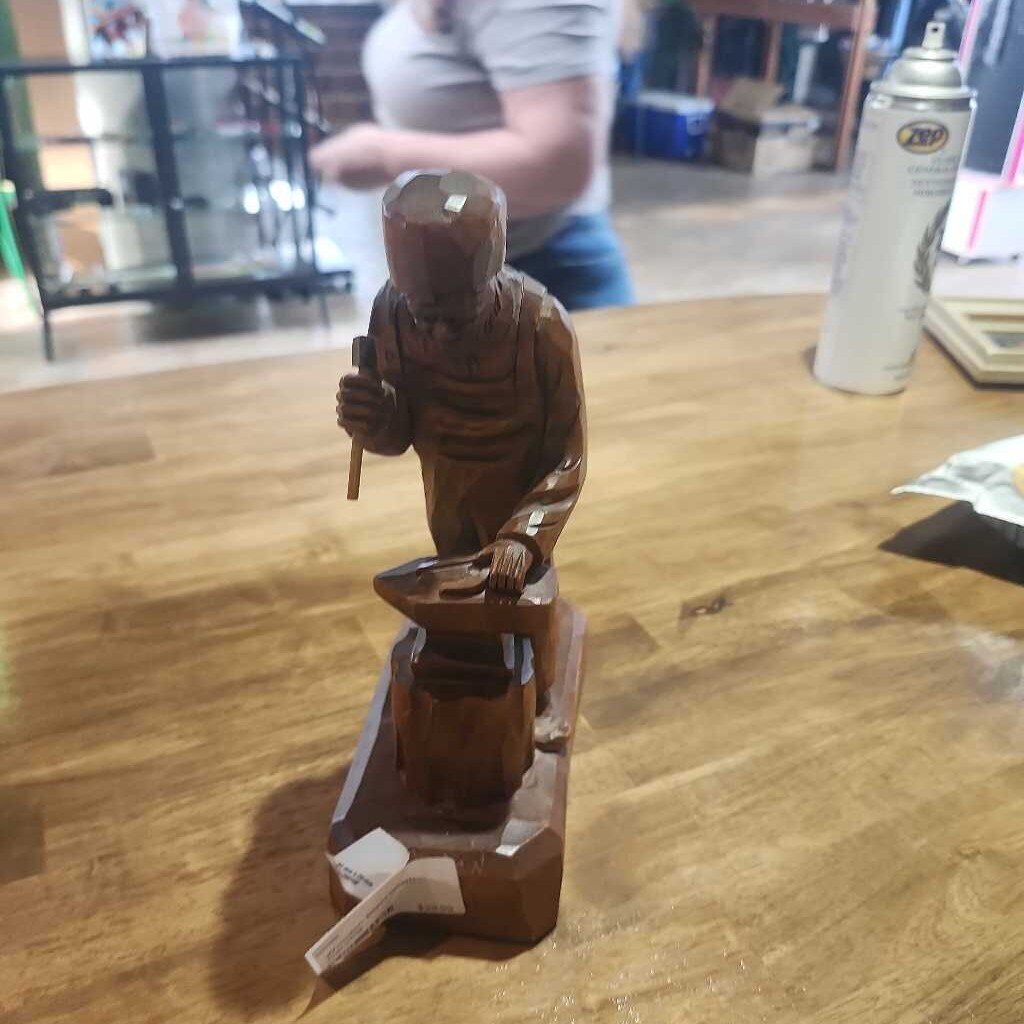 Wooden Blacksmith Carving